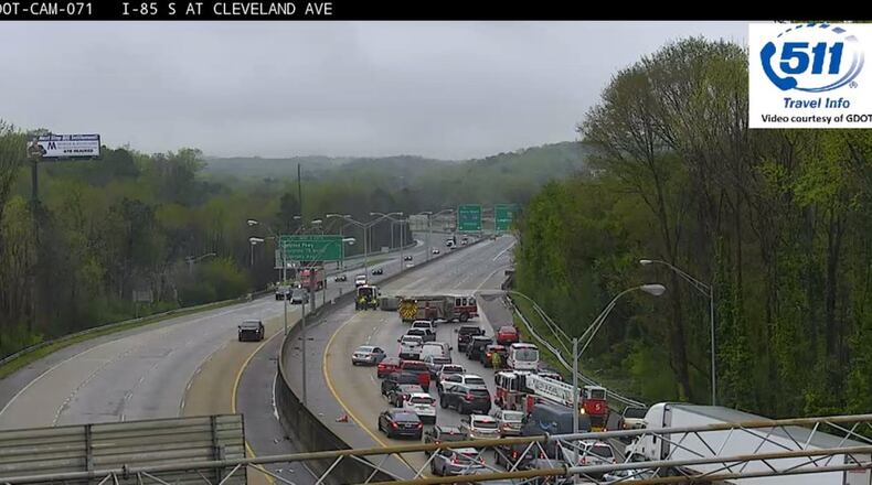 An overturned vehicle blocked all northbound lanes of I-85 in Atlanta.