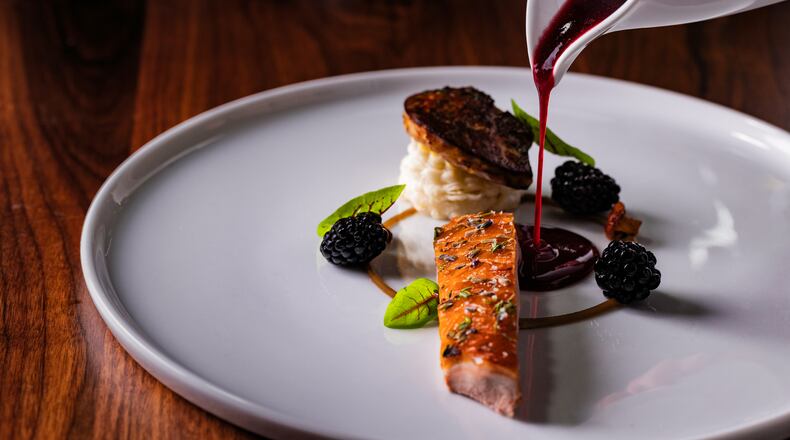 A tart blackbery gastrique balances rich duck breast at Lazy Betty. (Courtesy of Graftable)
