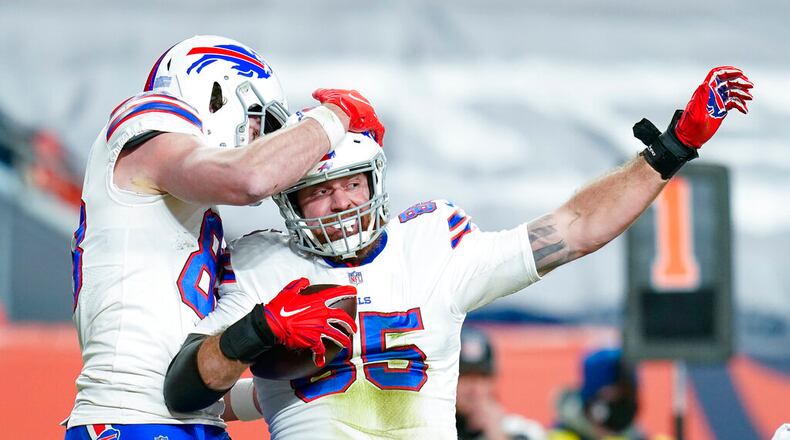 Buffalo Bills tight end Lee Smith (85) celebrates a touchdown against the Denver Broncos during an NFL football game, Saturday, Dec. 19, 2020, in Denver. (AP Photo/Jack Dempsey)