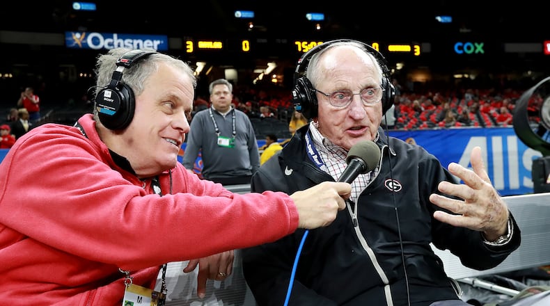 Former Georgia head coach Vince Dooley does a sideline interview. Curtis Compton ccompton@ajc.com