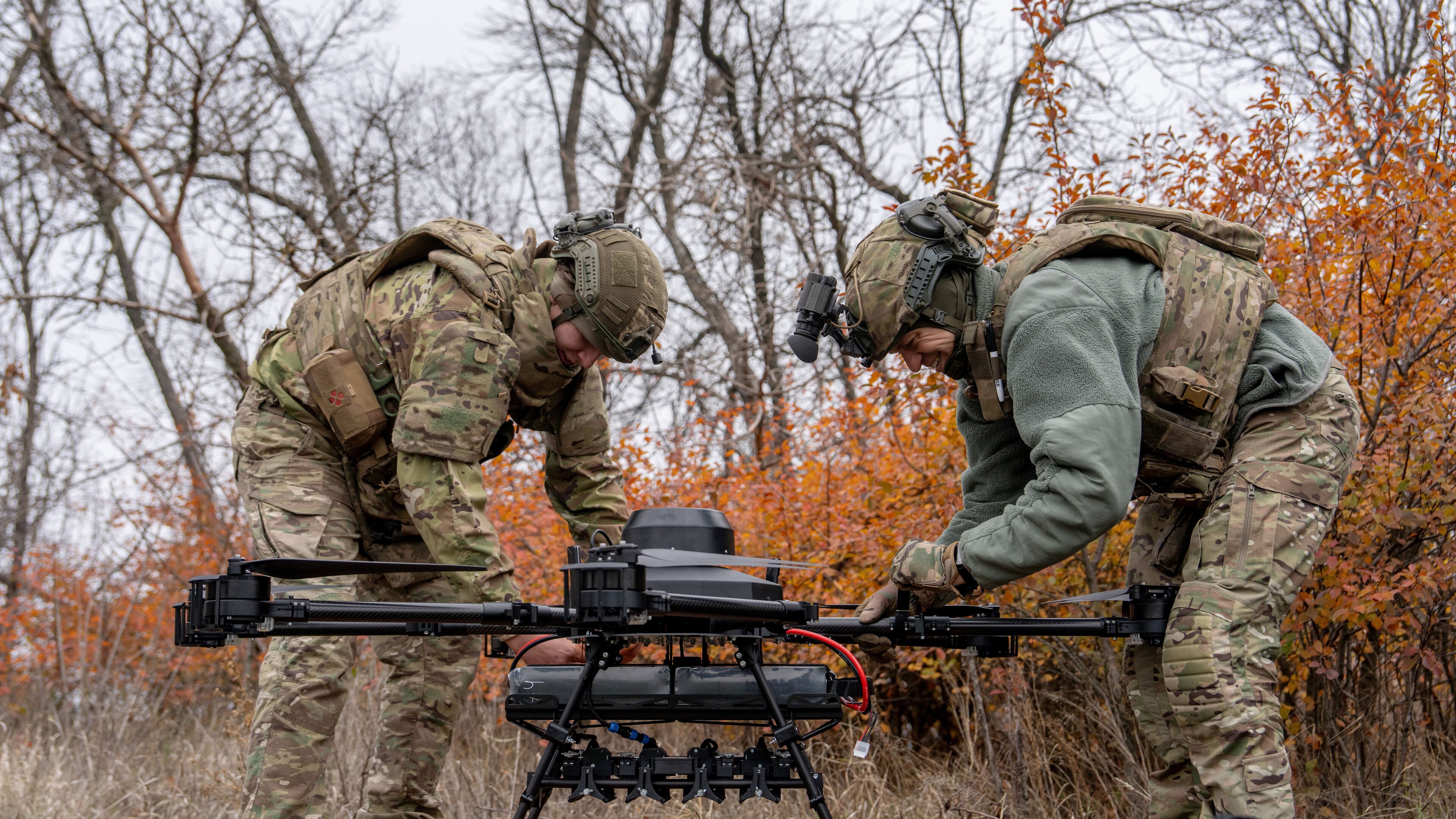 Ukrainian soldiers with the Kraken 1654 unit prepare a Vampire drone before a demonstration for The Associated Press, Wednesday, Nov. 5, 2025, in Kharkiv Oblast, Ukraine. (AP Photo/Julia Demaree Nikhinson)