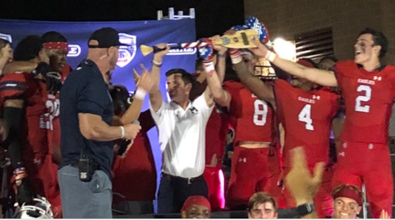 Milton celebrates its victory Friday night over nationallly ranked Cardinal Gibbons of Fort Lauderdale, Fla.