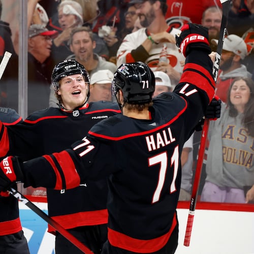 Carolina Hurricanes' Jackson Blake (53) celebrates his goal with teammate Taylor Hall (71) during the second period in Game 5 of the Eastern Conference finals NHL hockey Stanley Cup playoff series against the Montreal Canadiens in Raleigh, N.C., Friday, May 29, 2026. (AP Photo/Karl DeBlaker)