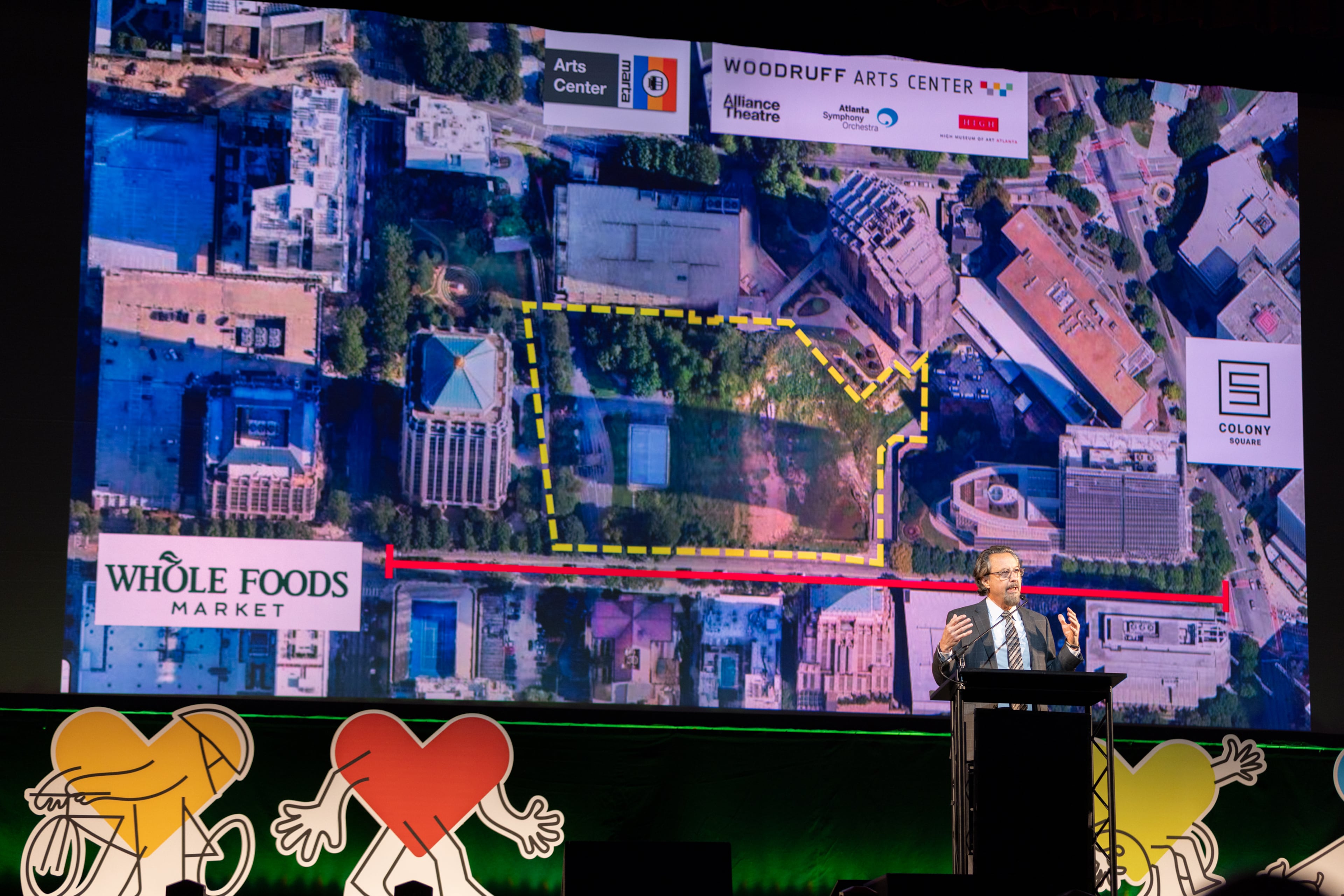 Kevin Green, Midtown Alliance president and CEO, speaks at the annual Midtown Alliance meeting at the Fox Theater. Midtown Alliance has said the site could include a 500-person outdoor performance space or a 10,000-square-foot indoor event venue (Arvin Temkar/AJC)