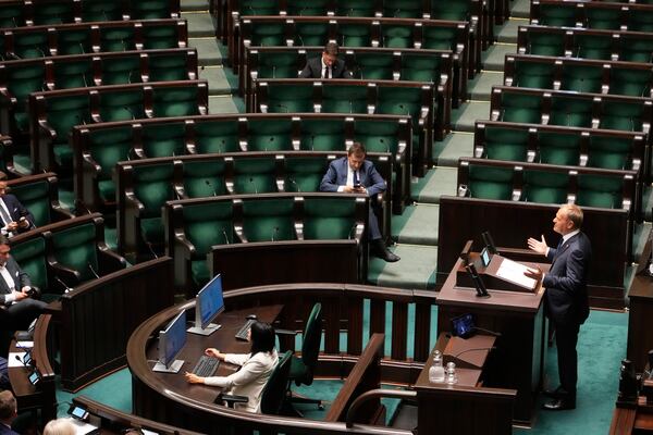 Poland's Prime Minister Donald Tusk addresses the Polish parliament on Wednesday, June 11, 2025, in Warsaw, Poland. (AP Photo/Czarek Sokolowski)