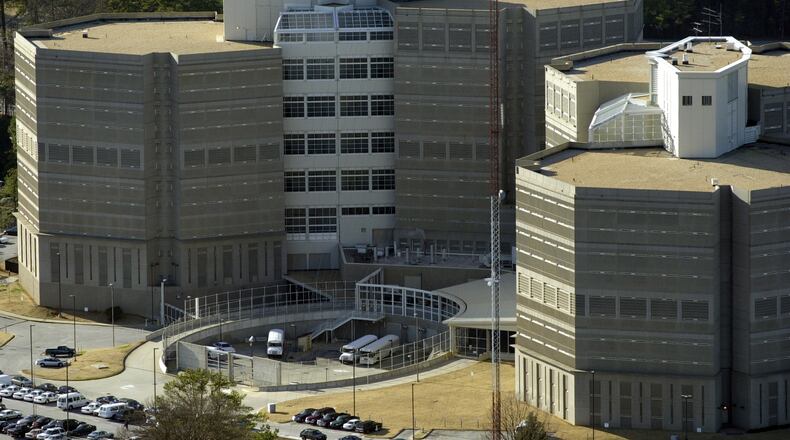 A victim was able to walk into the DeKalb County Jail and ask for help after being shot, officials said.