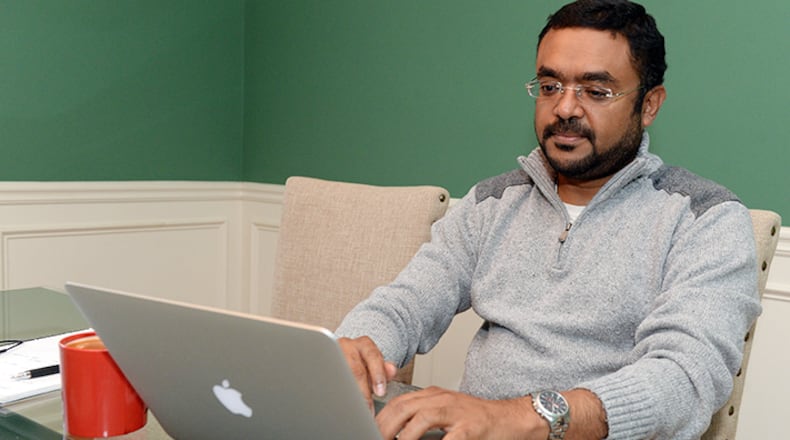 Shuaib Hanief, who runs the AtlantaMuslim.com website, works at his Lawrenceville home. Hanief says he works hard to make the site a place where members of the Muslim community in Atlanta can share their views.
