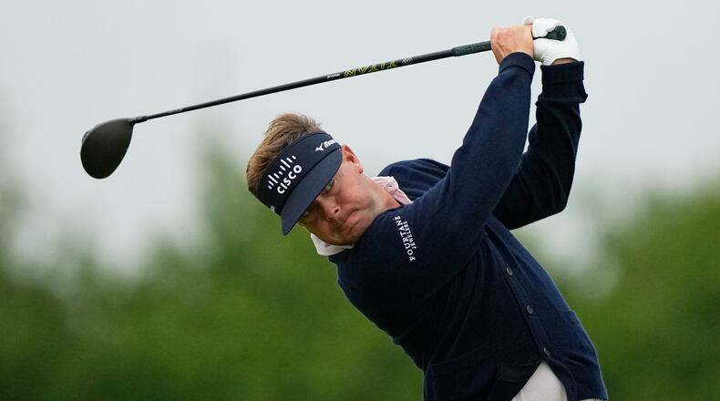 Keith Mitchell watches his tee shot on the 13th hole during the first round of the U.S. Open golf tournament at Shinnecock Hills Golf Club in Southampton, N.Y., Thursday, June 18, 2026.(AP Photo/Gerald Herbert)