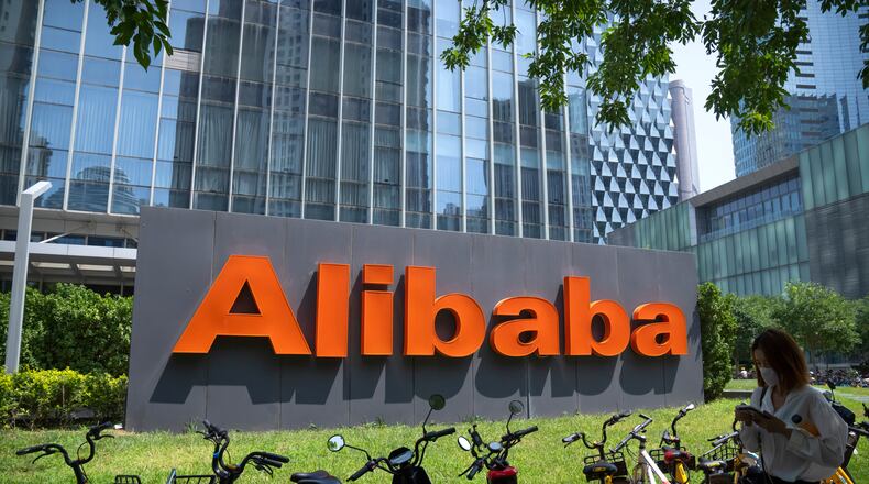FILE - The logo of Chinese technology firm Alibaba is seen at its office in Beijing, Aug. 10, 2021. (AP Photo/Mark Schiefelbein, File)