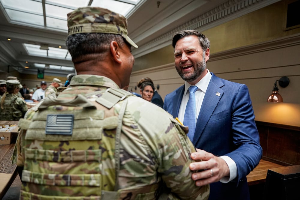 Vice President JD Vance greeted a member of the National Guard at Union Station in Washington on Wednesday.