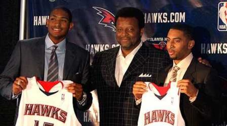 Billy Knight's final draft picks were Florida's Al Horford (left) and Texas A&M's Acie Law in 2007. Both were key in the Hawks' playoff series against Boston, and Horford made the NBA All-Rookie team. (Brant Sanderlin / AJC file)