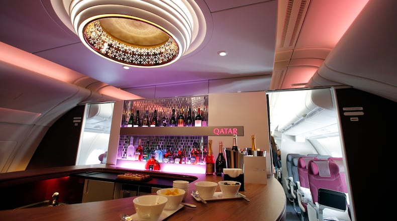 Interior view of the lounge bar in the second floor deck of the Airbus A380 of Qatar Airways presented at the Paris Air Show, in Le Bourget airport, north of Paris, Wednesday, June 17, 2015. Qatar Airways has brought 4 Airbus A380's in service since last year. (AP Photo/Francois Mori)