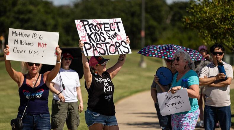 People gather on June 22 outside Gateway Church in Southlake, Texas., to protest child and sexual abuse in the church. (Chris Torres/McClatchy Tribune)