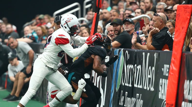 Arizona Rattlers wide receiver Jamal Miles (2) is tackled by the Sioux Falls Storm in the first half during the United Bowl on July 13, 2019 at Gila River Arena in Glendale, Ariz.