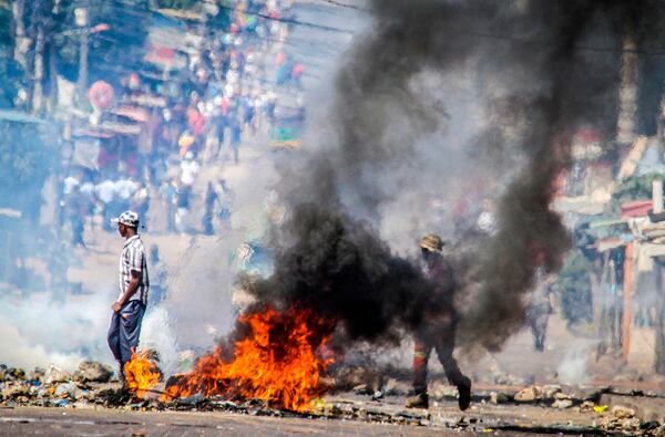 FILE- A barricade burns in Mozambique's capital, Maputo, Tuesday, Nov. 5, 2024. (AP Photo/Carlos Uqueio, file)