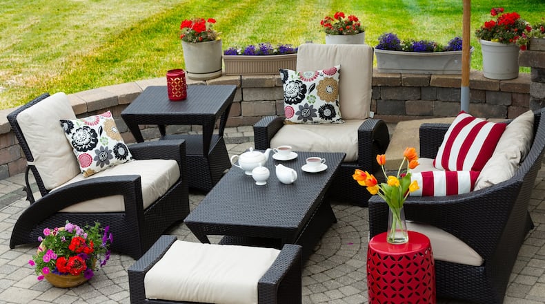 Proper care and cleaning can keep your patio furniture looking new for years to come. (Dreamstime)