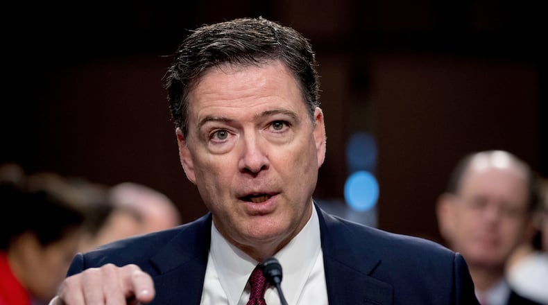 FILE - Former FBI Director James Comey speaks during a Senate Intelligence Committee hearing on Capitol Hill in Washington, June 8, 2017. (AP Photo/Andrew Harnik, File)