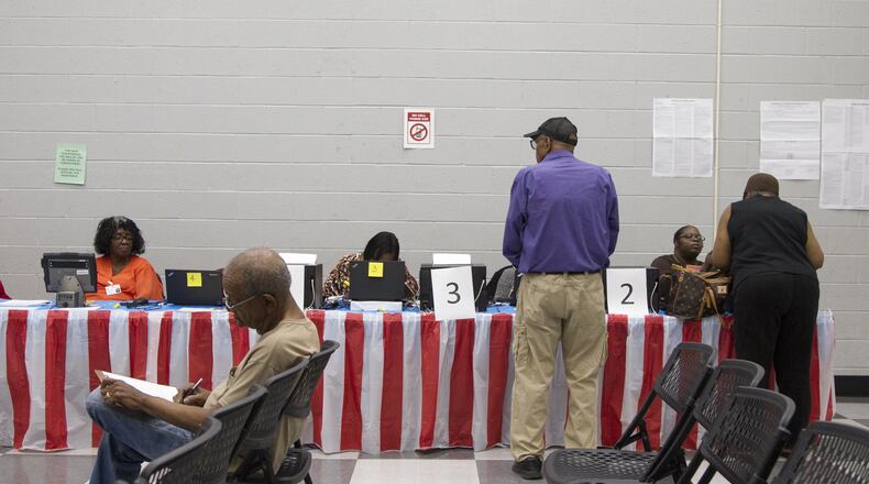 Voters take part in early voting for the Georgia primary on May 12 at the C.T. Martin Natatorium and Recreation Center in Atlanta. (REANN HUBER/REANN.HUBER@AJC.COM)
