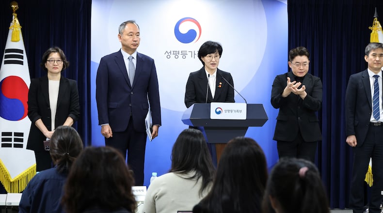 South Korean Gender Equality and Family Minister Won Min-kyong, center, speaks during a press briefing on the introduction of abortion pills at the Government Complex in Seoul, South Korea, Wednesday, Sept. 16, 2026. (Ahn Jeong-won/Yonhap via AP)