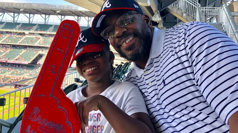 Njema and daughter Iyanla Williams enjoy their first game together at SunTrust Park.