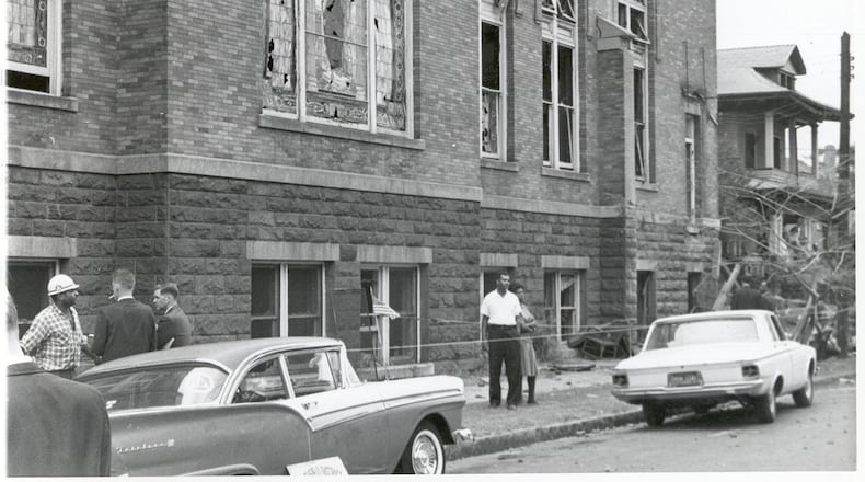 Investigators at the 16th Street Baptist church after it was bombed in 1963. FBI photo.