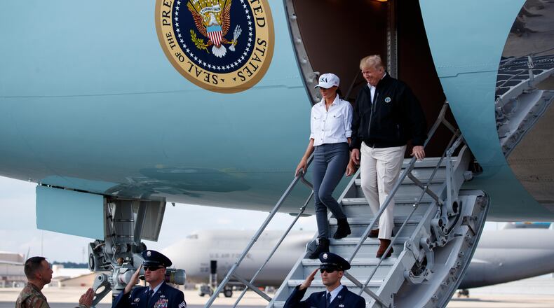 President Donald Trump and first lady Melania Trump arrive at Robins Air Force Base to visit areas affected by Hurricane Michael, Monday, Oct. 15, 2018, Robins Air Force Base, Ga.