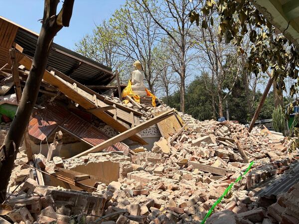A Buddhist monastery building that has collapsed is seen following an earthquake in Naypyitaw, Myanmar Sunday, March 30, 2025. (AP Photo/Aung Shine Oo)