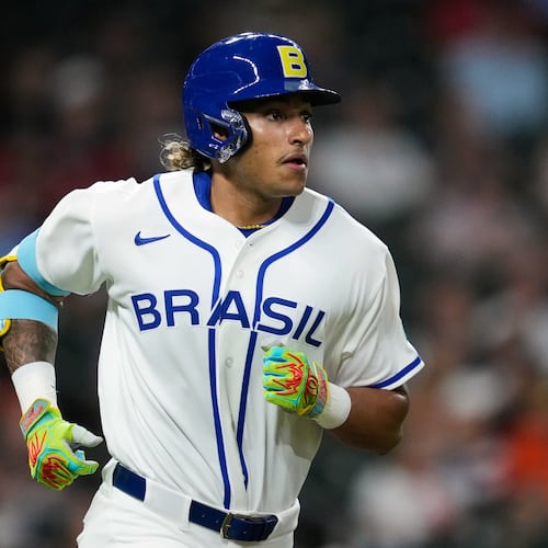 Brazil's Lucas Ramirez runs the bases after hitting a solo home run during the first inning of a World Baseball Classic game, Friday, March 6, 2026, in Houston. (AP Photo/Ashley Landis)
