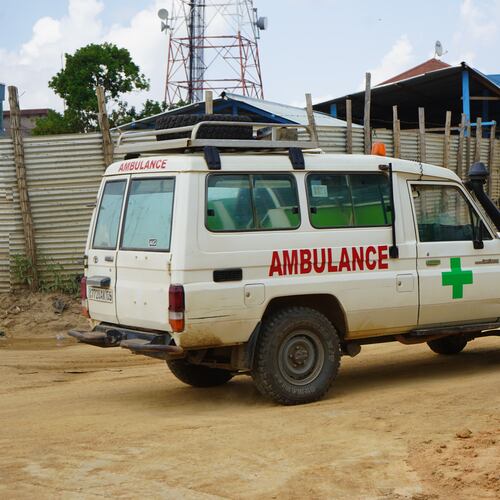 An ambulance drives past an ebola treatment centre in Bunia, Congo, Monday, July 20, 2026. (AP Photo/Prosper Heri Ngorora)