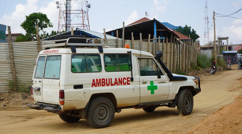 An ambulance drives past an ebola treatment centre in Bunia, Congo, Monday, July 20, 2026. (AP Photo/Prosper Heri Ngorora)