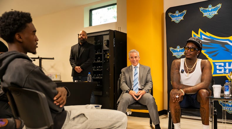 Students ask rapper Jeffery Williams (right), known as Young Thug, questions about fame, regret, and gun violence during a moderated discussion at Skyview High School, Friday, Aug. 1, 2025, in College Park. The visit is part of his court-ordered anti-gang outreach and took place in an intimate setting with students from the second-chance high school. (Olivia Bowdoin for the AJC)