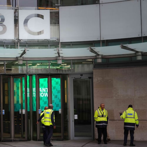 Security guards outside BBC Broadcasting House in London, Tuesday, Nov. 11, 2025. (AP Photo/Kirsty Wigglesworth)