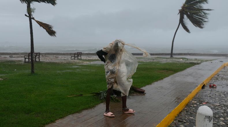 A man walks in Kingston, Jamaica, as Hurricane Melissa approaches, Tuesday, Oct. 28, 2025. (Matias Delacroix/AP)