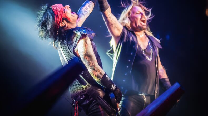 Nikki Sixx and Vince Neil share a moment. Photo: Dustin Jack.