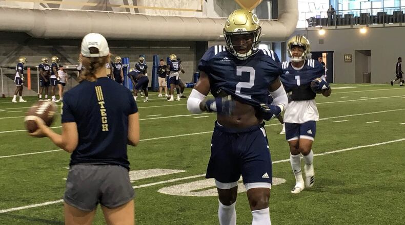 Georgia Tech safety Tariq Carpenter on the day that he was awarded the No. 2 jersey, August 15, 2019. His fellow safety and best friend Juanyeh Thomas is coming off the field behind him. (AJC photo by Ken Sugiura)