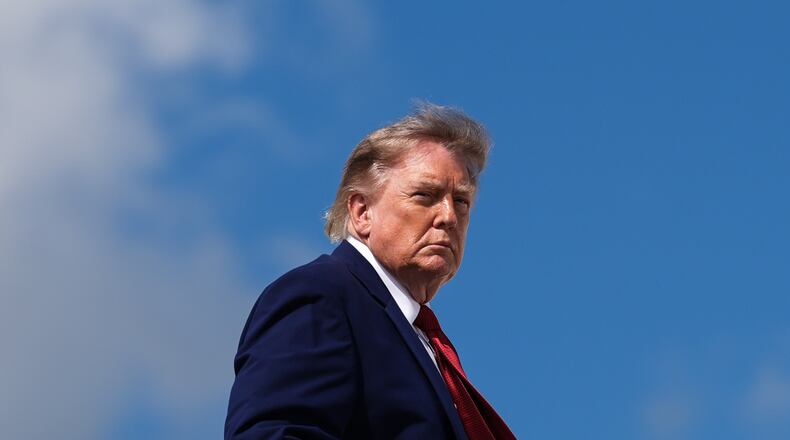 FILE - President Donald Trump boards Air Force One, Aug. 7, 2026, at Joint Base Andrews, Md. (AP Photo/Julia Demaree Nikhinson, File)