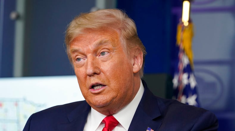 President Donald Trump announced Thursday that he has canceled the bulk of the Republican National Convention scheduled for Florida next month, citing a “flare-up” of the coronavirus. (AP Photo/Evan Vucci)