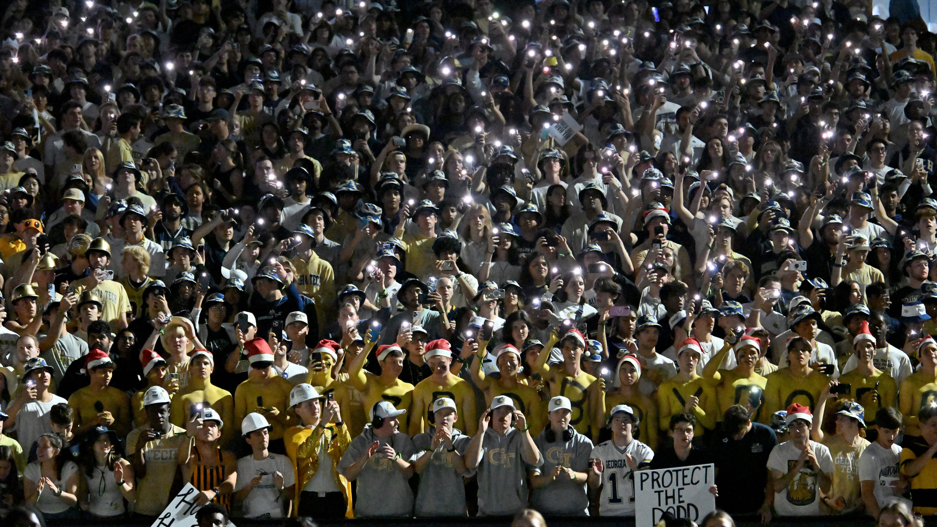 Georgia Tech fans cheer before the final regular-season home game against Pittsburgh at Bobby Dodd Stadium, Saturday, Nov. 22, 2025, in Atlanta. (Hyosub Shin/AJC)