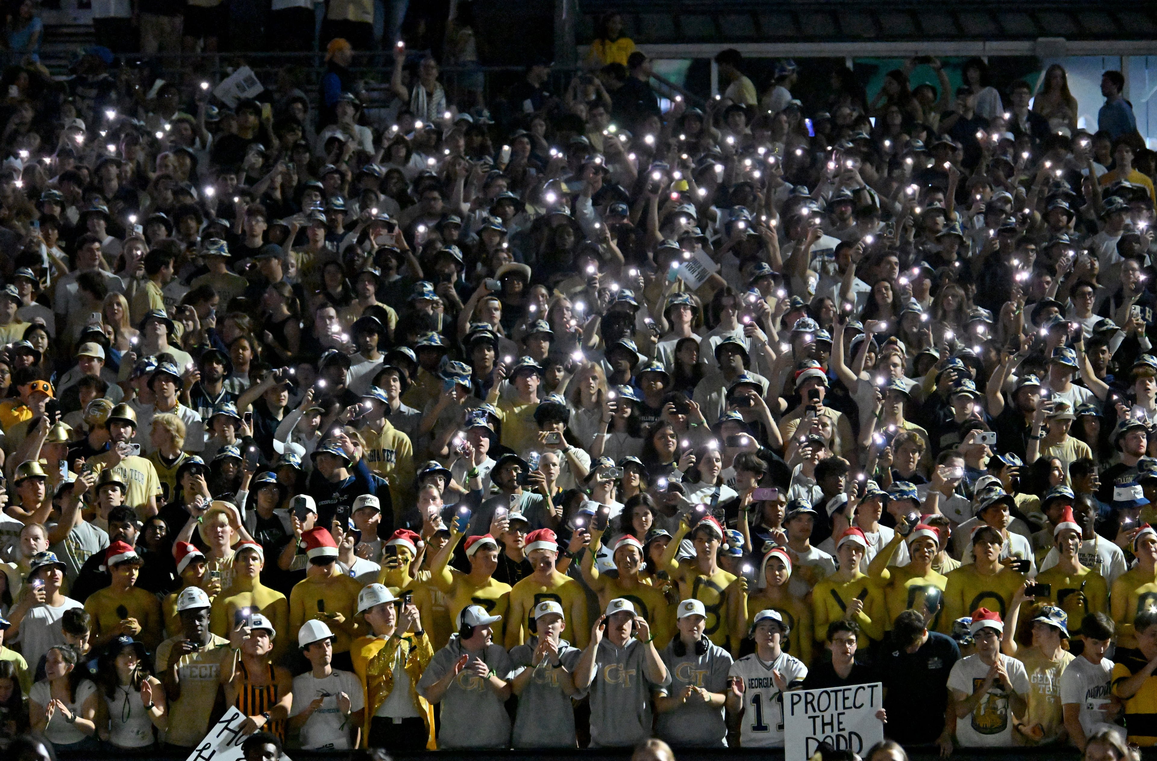 Georgia Tech fans cheer before the final regular-season home game against Pittsburgh at Bobby Dodd Stadium, Saturday, November 22, 2025 in Atlanta. (Hyosub Shin / AJC)