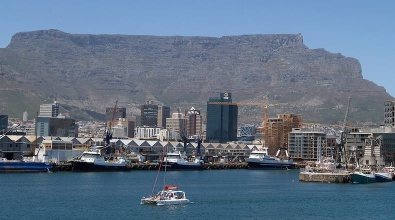 Table Mountain stands beyond the harbor area in Cape Town, South Africa, on Dec. 20, 2016. (Photo: Dean Hutton/Bloomberg)