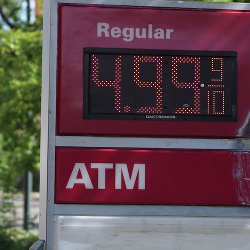 The per-gallon price for regular unleaded fuel is displayed electronically on a sign outside a Conoco gasoline station Wednesday, Sept. 9, 2026, in Denver. (AP Photo/David Zalubowski)