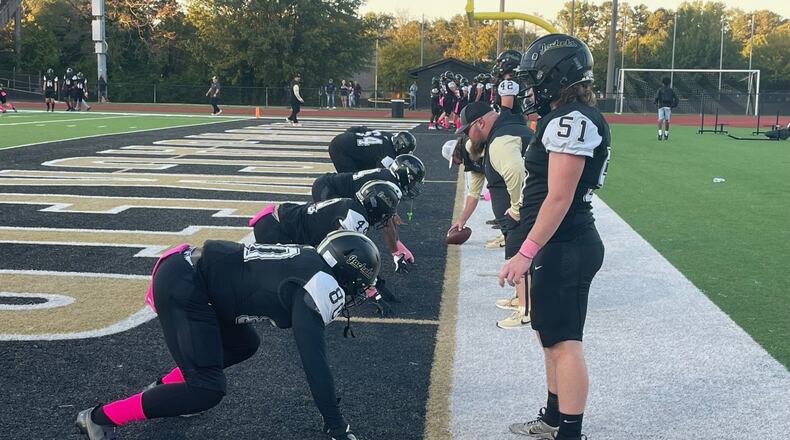 Sprayberry linemen warm up before their Region 6-5A against River Ridge in Marietta on Oct. 11, 2024. Sprayberry won 30-27.