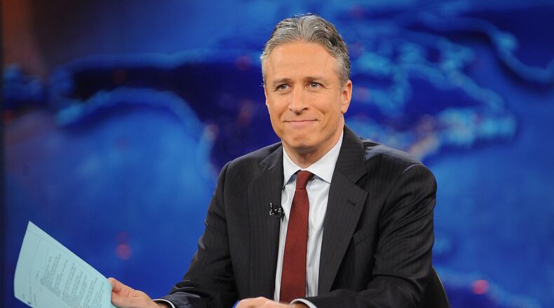 FILE - This Nov. 30, 2011 file photo shows television host Jon Stewart during a taping of "The Daily Show with Jon Stewart" in New York. Comedy Central announced Tuesday, Feb. 10, 2015, that Stewart will will leave "The Daily Show" later this year. (AP Photo/Brad Barket, File) Jon Stewart on set in 2011. (AP file/Brad Barket)