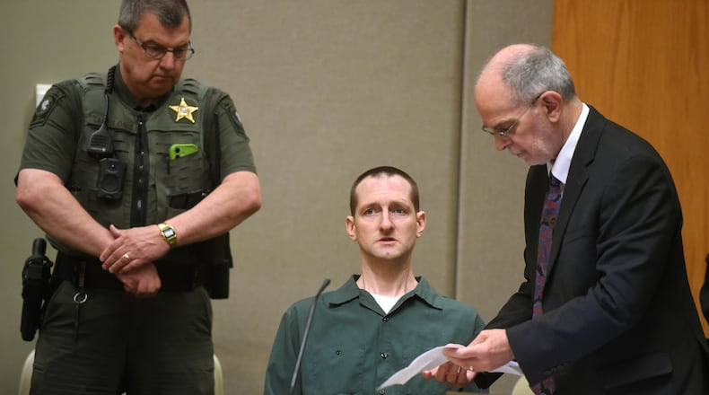 Robert Tulloch, sitting, waits for his resentencing to start with his attorney Richard Guerriero on Monday, July 13, 2026, in Grafton Superior Court in North Haverhill, N.H. (Jennifer Hauck/Valley News via AP, Pool)