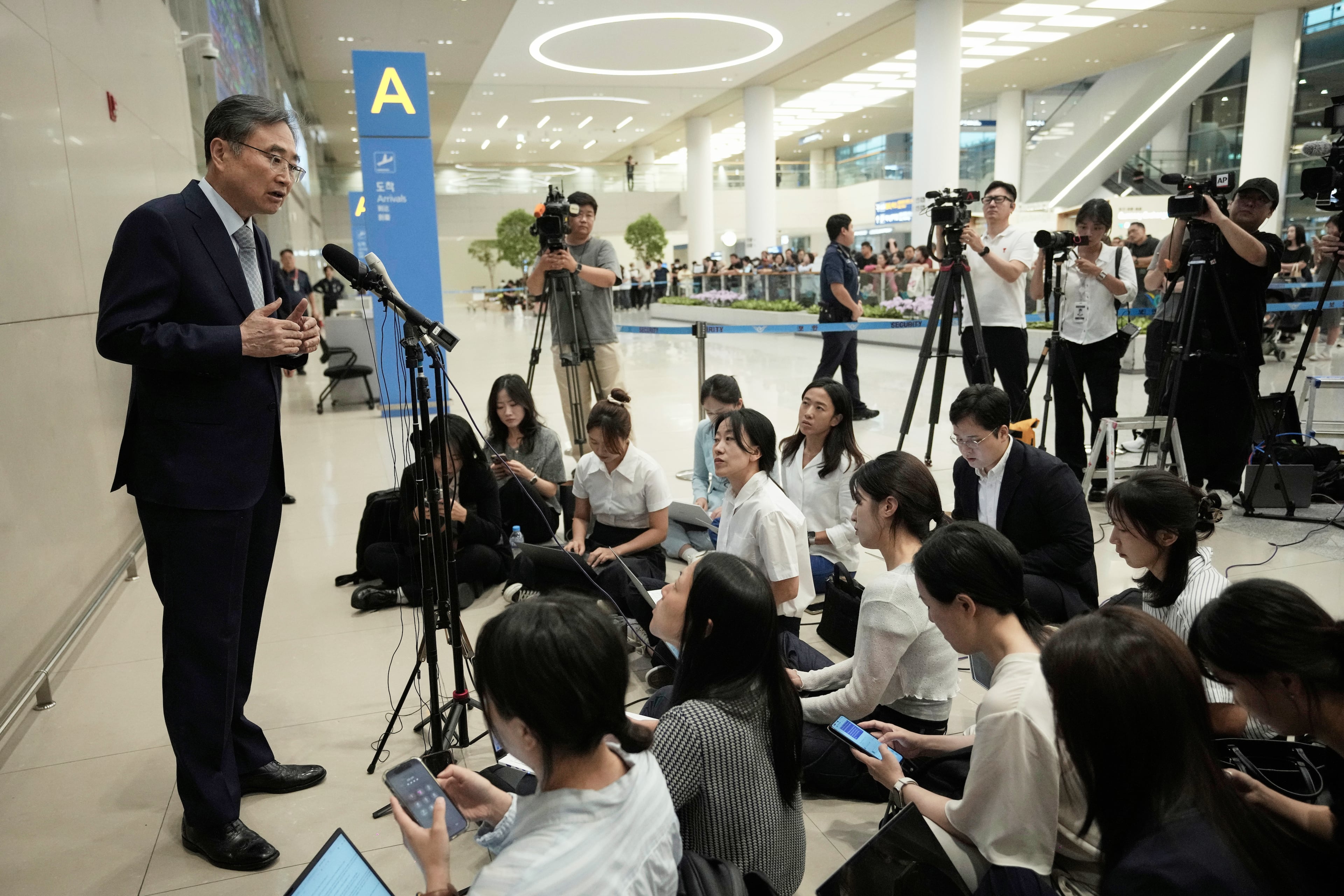 South Korean Foreign Minister Cho Hyun speaks to the media after returning from Washington at the Incheon International Airport in Incheon, South Korea, Friday, Sept. 12, 2025. (Ahn Young-joon/AP)