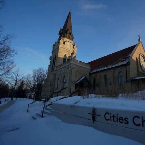Cities Church is seen in St. Paul, Minn. where activists shut down a service claiming the pastor was also working as an ICE agent, Monday, Jan. 19, 2026 in St. Paul, Minn. (AP Photo/Angelina Katsanis)