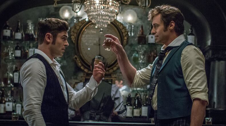Hugh Jackman (P.T. Barnum) and Zac Efron (Philip Carlisle) star in Twentieth Century Fox's THE GREATEST SHOWMAN.