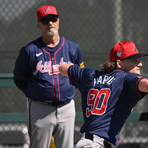Hayden Harris throws in the bullpen during spring training baseball workouts at CoolToday Park, Thursday, Feb. 15, 2024, in North Port, Florida. (Hyosub Shin/AJC)