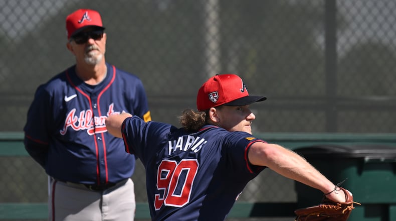 Braves pitcher Hayden Harris throws in the bullpen during spring training baseball workouts at CoolToday Park, Thursday, Feb., 15, 2024, in North Port, Florida. (Hyosub Shin / Hyosub.Shin@ajc.com)