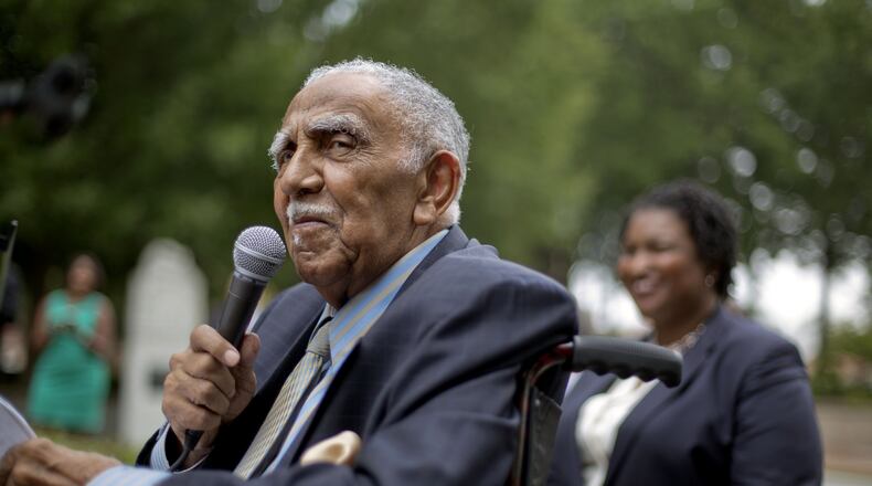 FILE - In this Aug. 14, 2013, file photo, civil rights leader the Rev. Joseph E. Lowery speaks at an event in Atlanta announcing state lawmakers from around the county have formed an alliance they say will combat restrictive voting laws, Lowery, a veteran civil rights leader who helped the Rev. Dr. Martin Luther King Jr. found the Southern Christian Leadership Conference and fought against racial discrimination, died Friday, March 27, 2020, a family statement said. He was 98. (AP Photo/David Goldman, File)